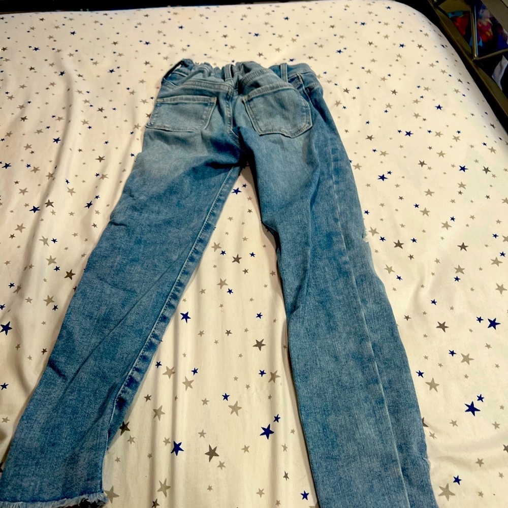 Blue jeans with rips